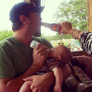 Dad_Drinking_Beer_While_Feeding_Baby